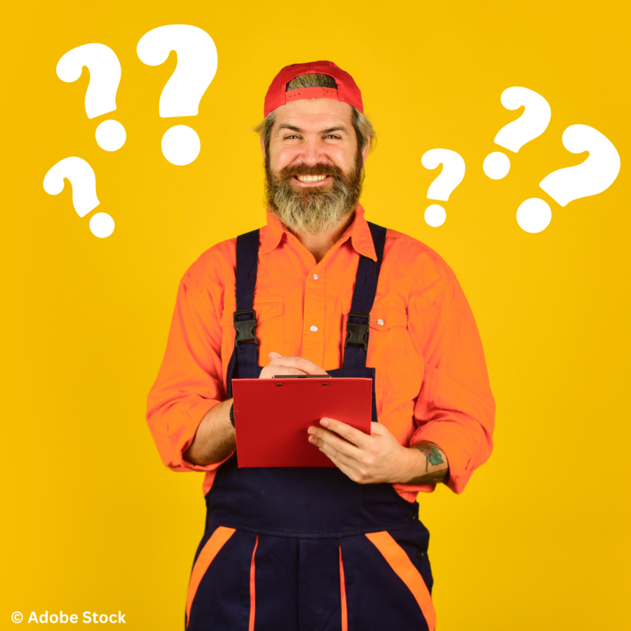 A smiling bearded man in a bright orange shirt and black dungarees is holding a clipboard. There are question marks around him. Is he a roofing consultant or a salesperson?