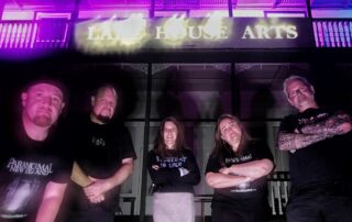The Paranormal NZ team pictured outside the Lake House in Takapuna. Sean is on the far right.